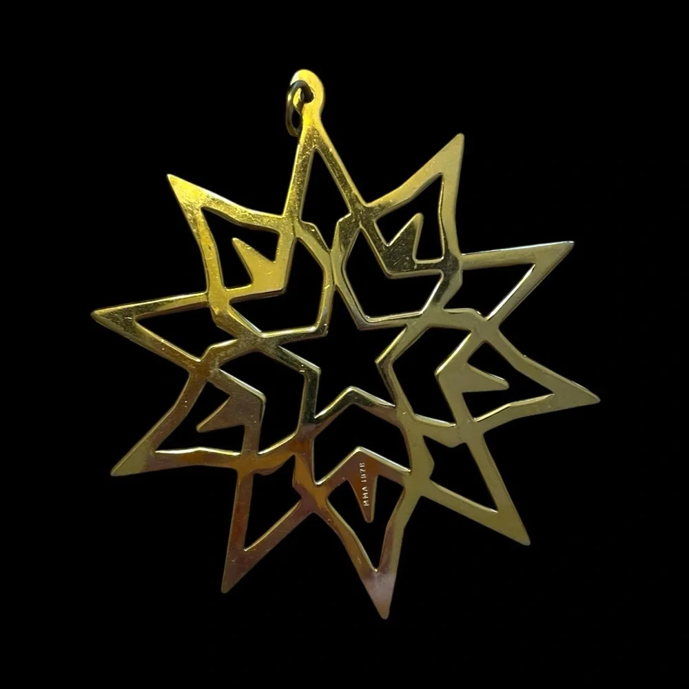 Metropolitan Museum of Art star ornament, brass with gold plate, vintage 1978